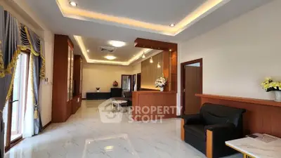 Spacious and elegant living room with modern decor and luxurious finishes