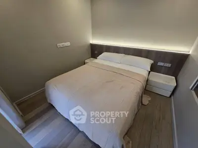 Cozy modern bedroom with elegant lighting and minimalist design