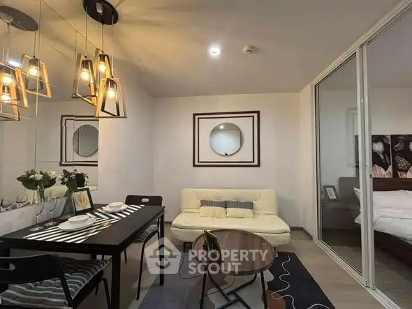 Stylish modern living room with elegant dining area and cozy seating.