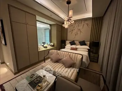 Luxurious bedroom with elegant decor and cozy seating area, perfect for relaxation and comfort.