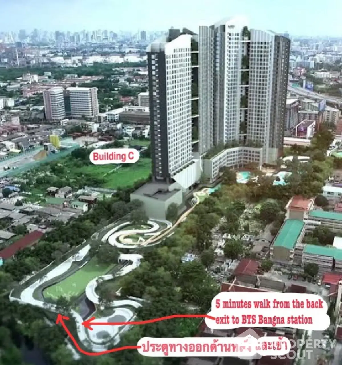 Modern high-rise building with lush surroundings near BTS Bangna station