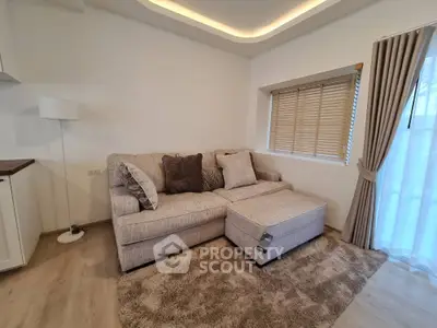 Cozy living room with plush sofa and elegant decor
