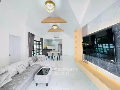 Luxurious modern living room with elegant decor and open kitchen layout