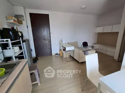 Modern living room with open kitchen and minimalist decor