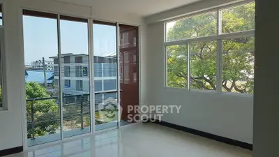 Bright corner unit with large windows offering a great view of the neighborhood.