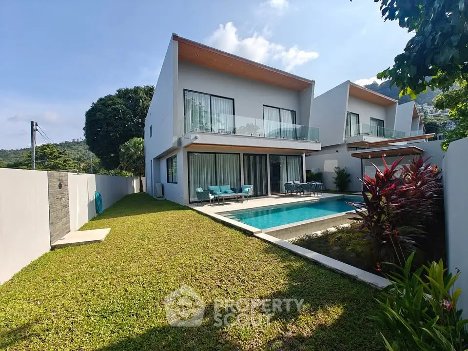Modern luxury villa with private pool and lush garden, perfect for serene living.