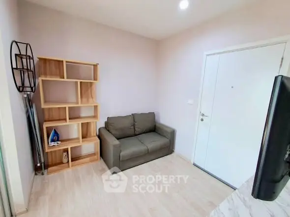 Cozy living room with modern sofa and stylish shelving unit