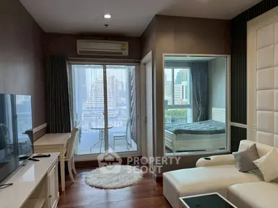 Modern living room with city view, stylish furniture, and cozy ambiance in urban apartment.