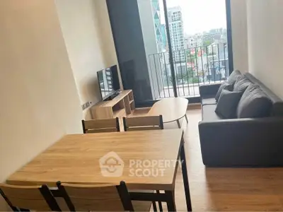 Modern living room with balcony view in urban apartment