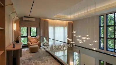 Luxurious modern living room with high ceilings and elegant lighting