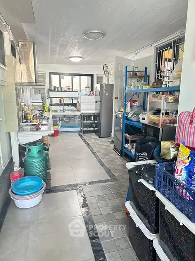 Spacious kitchen with modern appliances and ample storage space