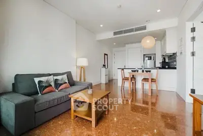 Spacious modern living room with open kitchen and stylish decor