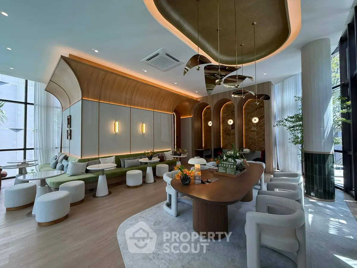 Luxurious modern living room with elegant lighting and stylish furniture, perfect for sophisticated gatherings.