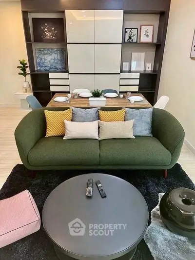 Stylish modern living room with elegant decor and cozy seating area.
