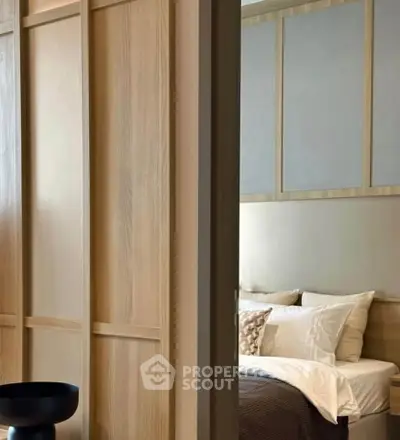 Luxurious bedroom with elegant wood paneling and plush bedding, perfect for relaxation and comfort.