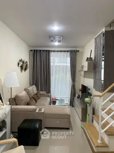 Cozy living room with modern decor and natural light