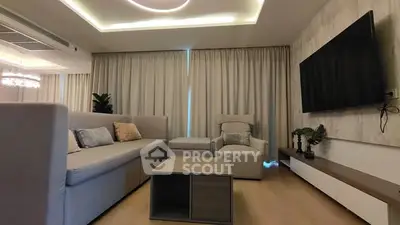 Modern living room with stylish furniture and ambient lighting