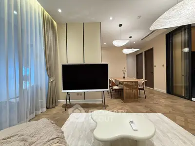 Luxurious modern living room with elegant dining area and stylish decor