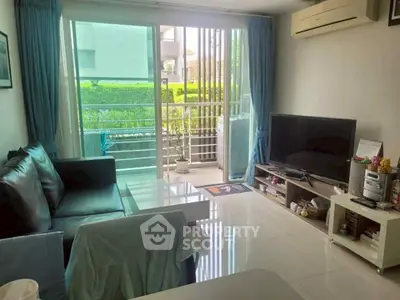 Bright living room with modern furniture and balcony view
