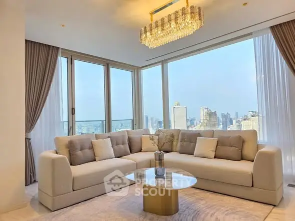 Luxurious living room with panoramic city view and elegant chandelier