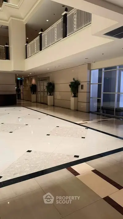Luxurious building lobby with elegant marble flooring and modern design.