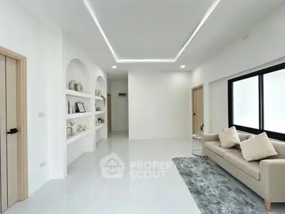 Modern minimalist living room with sleek design and neutral tones