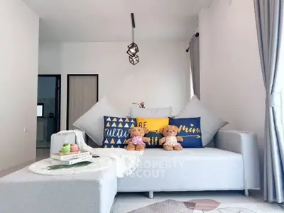 Chic modern living room with stylish sofa and decorative pillows