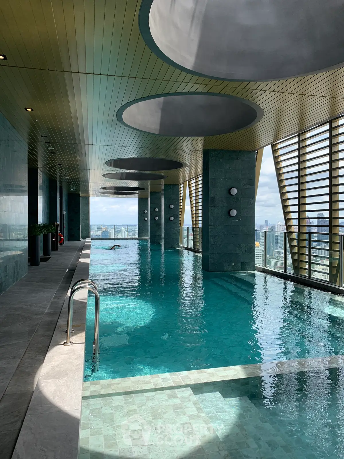 Luxurious rooftop pool with stunning city views and modern design.
