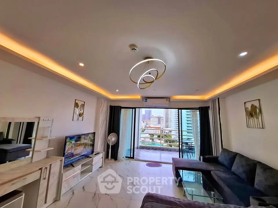 Modern living room with stylish lighting and city view balcony