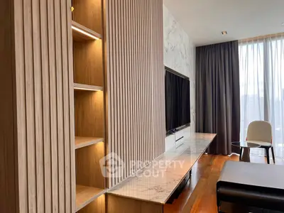 Modern living room with sleek wooden paneling and marble TV stand