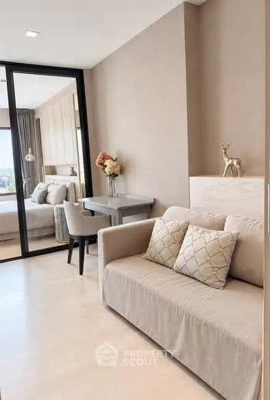 Modern living room with beige sofa and elegant decor in a stylish apartment