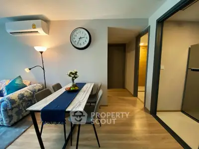 Modern living room with stylish dining area and cozy ambiance
