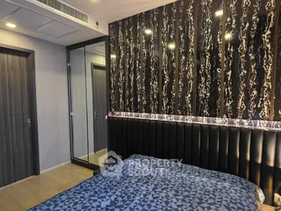 Luxurious bedroom with modern design and mirrored wardrobe