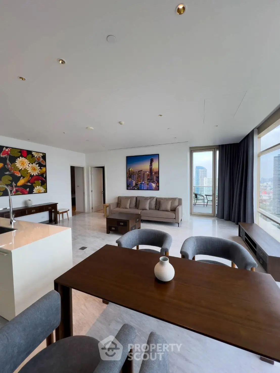 Spacious modern living room with city view, elegant decor, and open layout in luxury apartment.