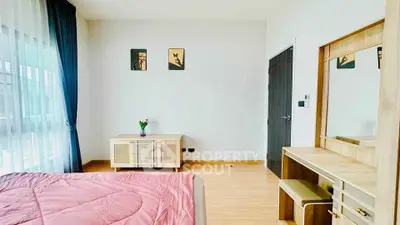 Bright and spacious bedroom with modern decor and natural light