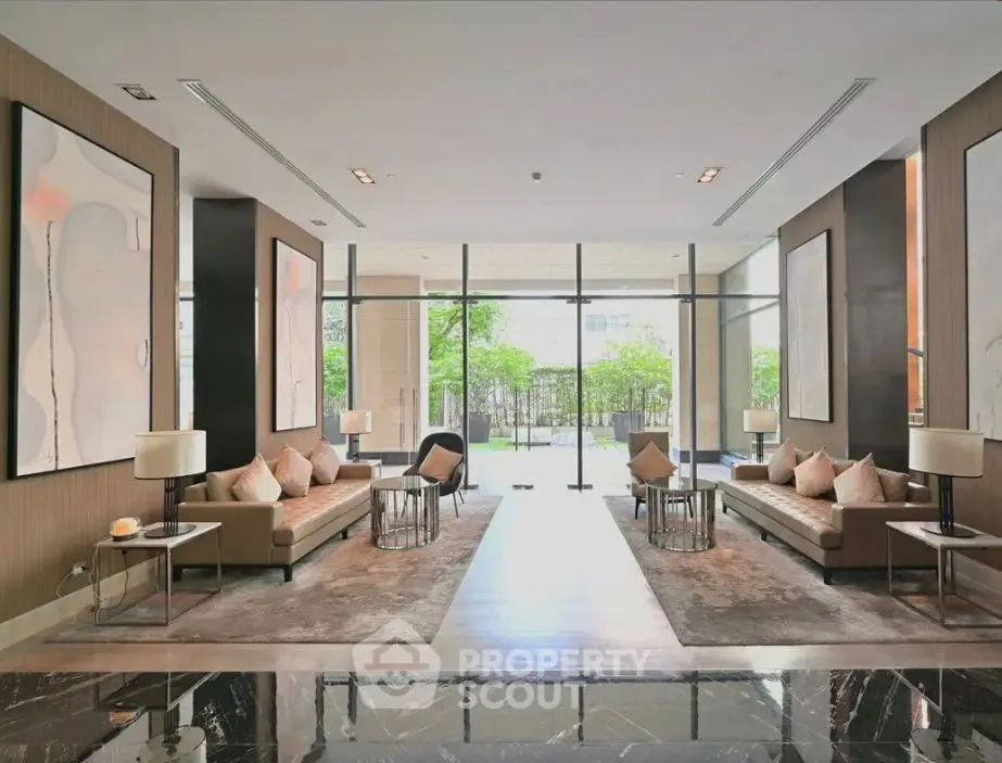 Luxurious modern living room with elegant decor and floor-to-ceiling windows