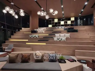 Luxurious modern living area with tiered seating and stylish lighting