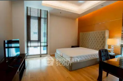 Luxurious bedroom with elegant decor and natural light in modern apartment