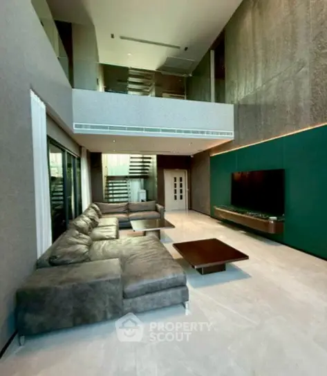 Luxurious modern living room with high ceilings and stylish furniture