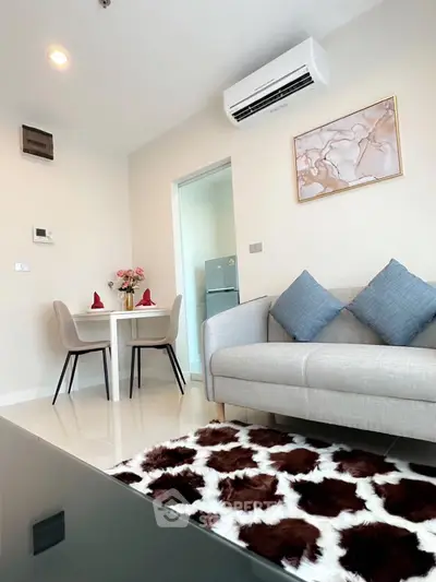 Modern living room with stylish decor and cozy seating area