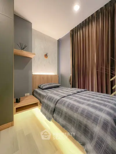 Modern cozy bedroom with stylish decor and ambient lighting