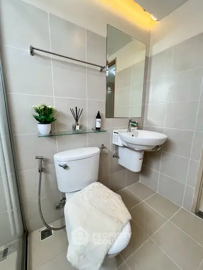 Modern bathroom with sleek fixtures and elegant decor