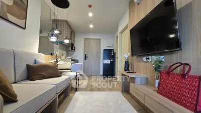 Modern living room with stylish decor and open kitchen layout