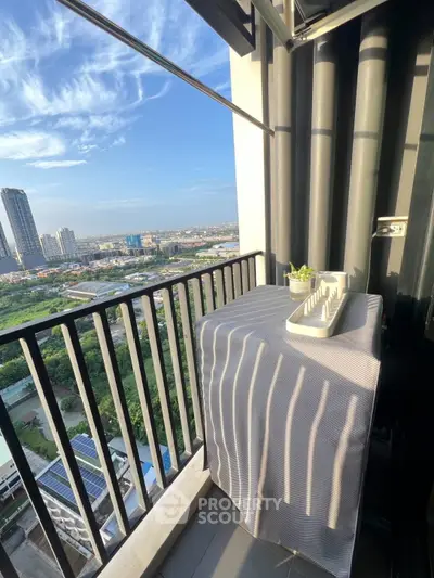 Charming balcony with stunning city view, perfect for relaxation and enjoying the skyline.