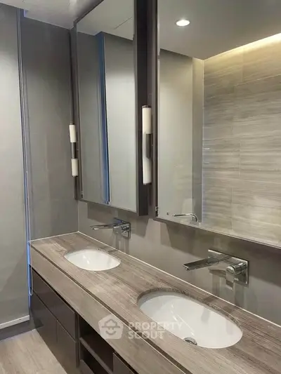 Modern bathroom with dual sinks and sleek design