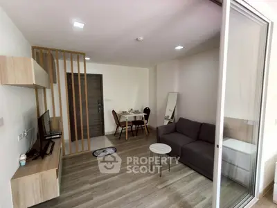 Modern living room with sleek furniture and open layout