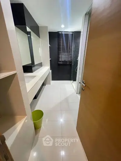 Modern bathroom with sleek design and glass shower enclosure