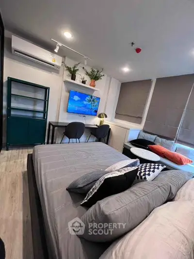 Modern studio apartment with stylish decor and cozy ambiance