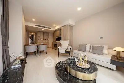 Luxurious modern living room with elegant decor and open kitchen layout
