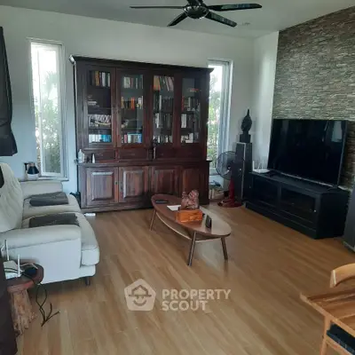 Spacious living room with elegant wooden furniture and modern decor